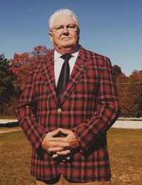 Man in plaid jacket outdoors