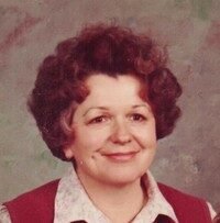 Smiling woman with curly hair portrait